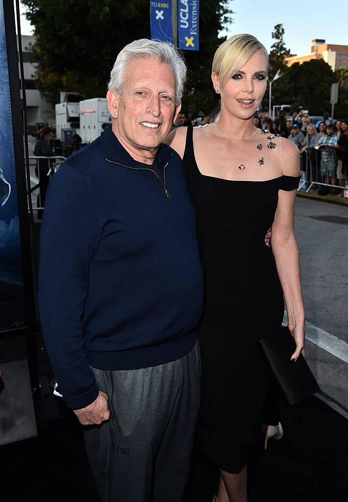 WESTWOOD, CALIFORNIA - APRIL 11:  Producer Joe Roth and actress Charlize Theron attend the premiere of  Universal Pictures' "The Huntsman: Winter's War" at the Regency Village Theatre on April 11, 2016 in Westwood, California.  (Photo by Kevin Winter/Getty Images)