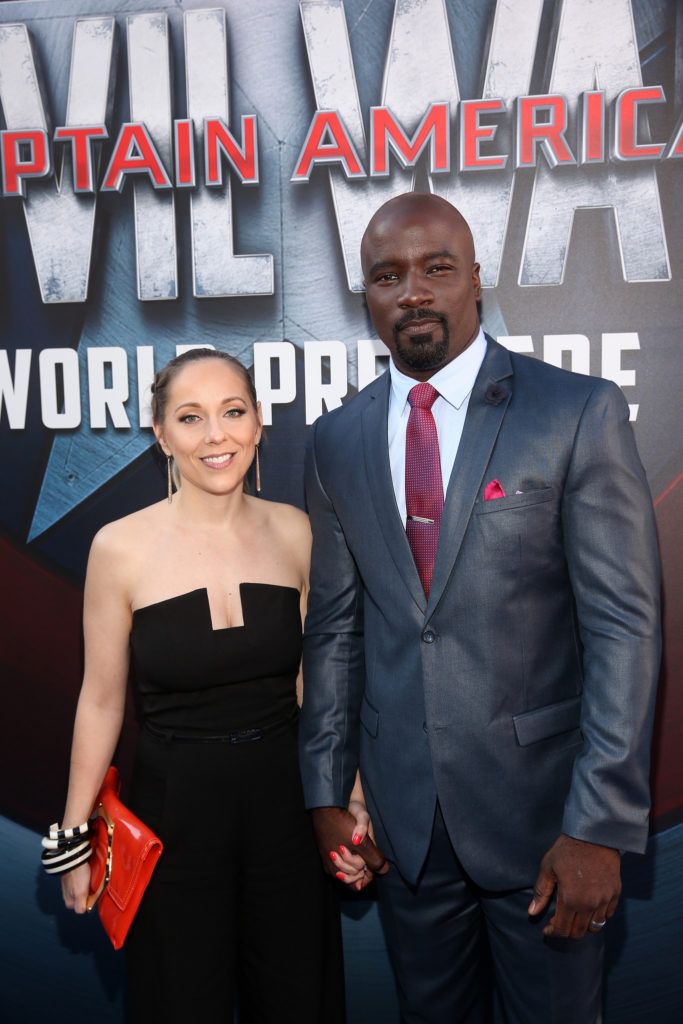 HOLLYWOOD, CALIFORNIA - APRIL 12:  Actor Mike Colter (R) and Iva Colter attend The World Premiere of Marvel's "Captain America: Civil War" at Dolby Theatre on April 12, 2016 in Los Angeles, California.  (Photo by Jesse Grant/Getty Images for Disney)