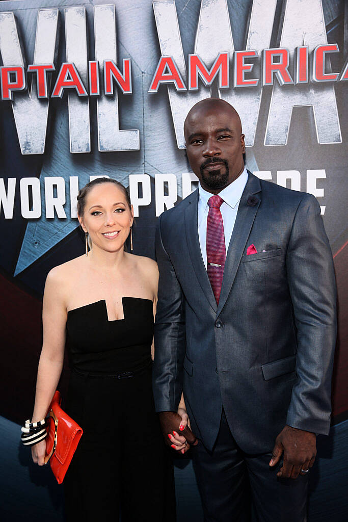 HOLLYWOOD, CALIFORNIA - APRIL 12:  Actor Mike Colter (R) and Iva Colter attend The World Premiere of Marvel's "Captain America: Civil War" at Dolby Theatre on April 12, 2016 in Los Angeles, California.  (Photo by Jesse Grant/Getty Images for Disney)