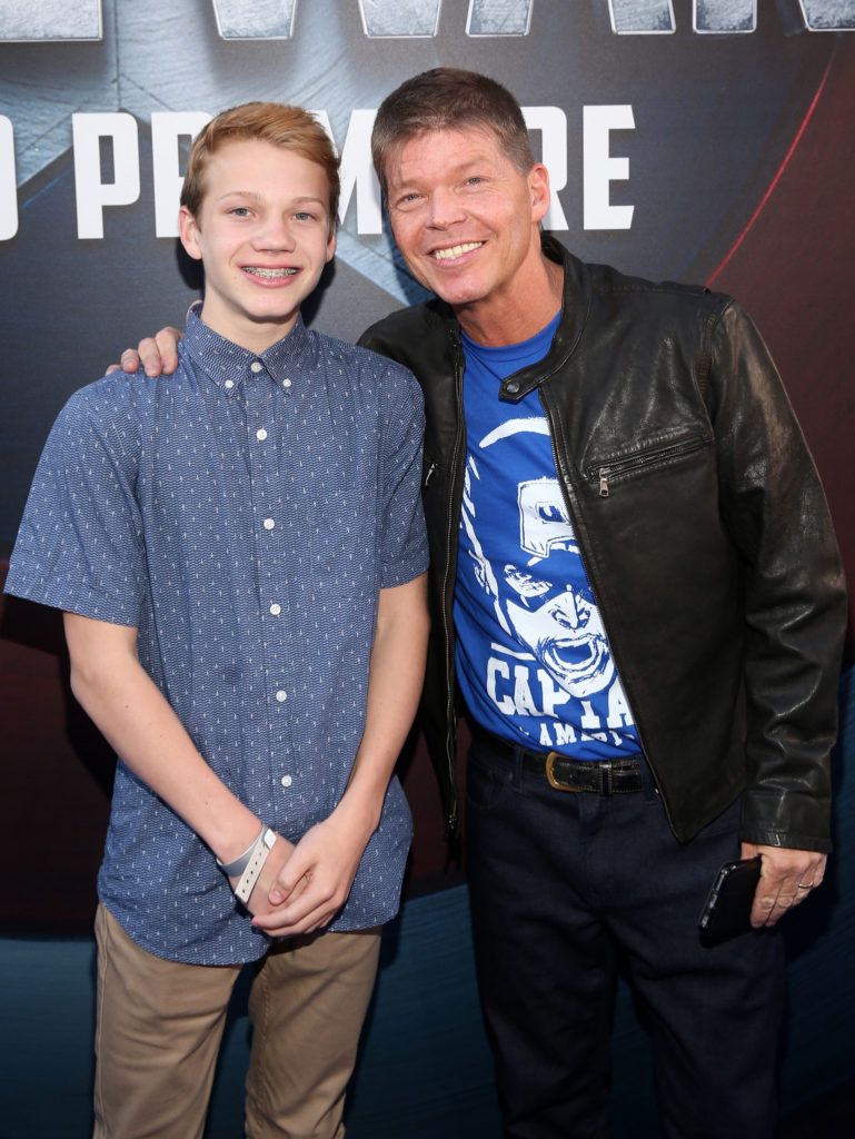 HOLLYWOOD, CALIFORNIA - APRIL 12:  Comic book creator Rob Liefeld (R) and son Chase Liefeld attend The World Premiere of Marvel's "Captain America: Civil War" at Dolby Theatre on April 12, 2016 in Los Angeles, California.  (Photo by Jesse Grant/Getty Images for Disney)