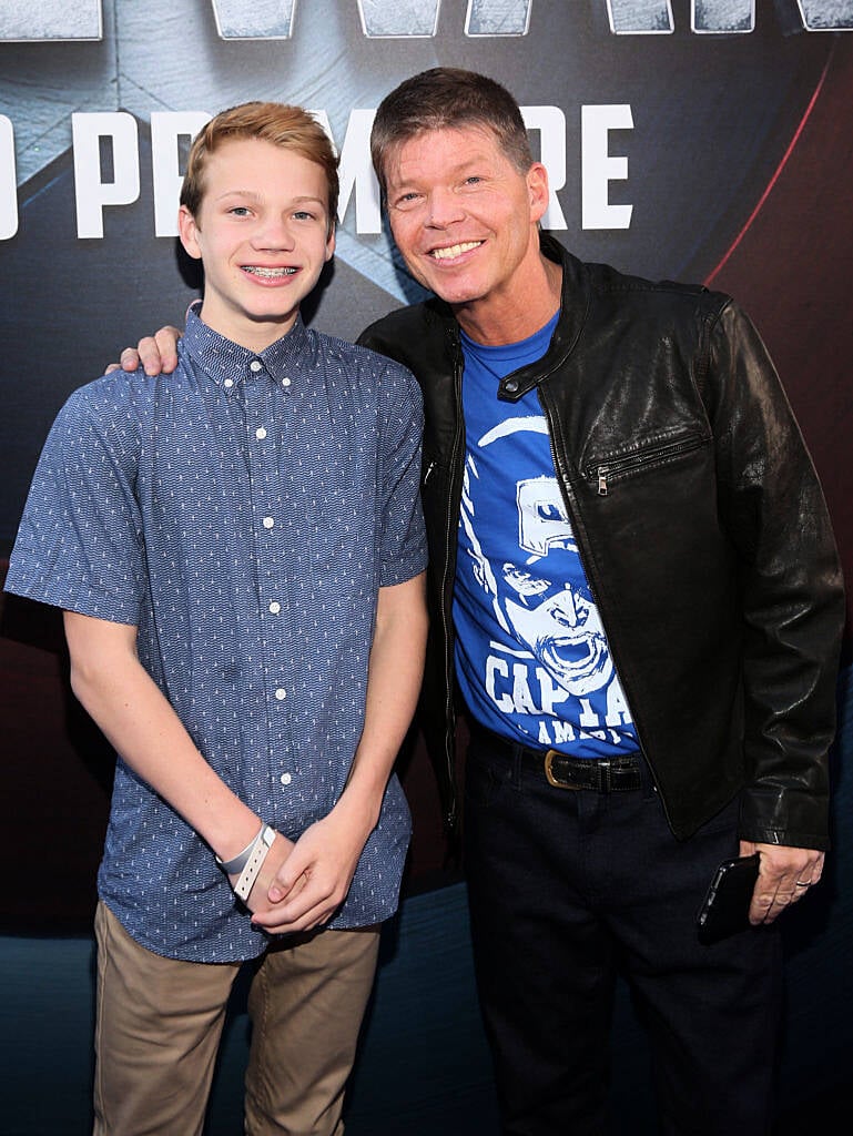 HOLLYWOOD, CALIFORNIA - APRIL 12:  Comic book creator Rob Liefeld (R) and son Chase Liefeld attend The World Premiere of Marvel's "Captain America: Civil War" at Dolby Theatre on April 12, 2016 in Los Angeles, California.  (Photo by Jesse Grant/Getty Images for Disney)