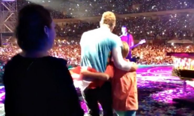 Chris Martin brings Moses onstage for his 10th birthday