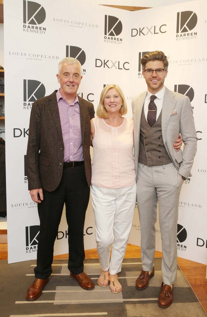Darren Kennedy  with his parents Michael and Valerie  pictured at the launch of the Darren Kennedy collection for Louis Copeland at the Louis Copeland store on Wicklow Street.  Guests enjoyed signature World Class cocktails specifically crafted by Diageo Reserve. Photo: Leon Farrell/Photocall Ireland.