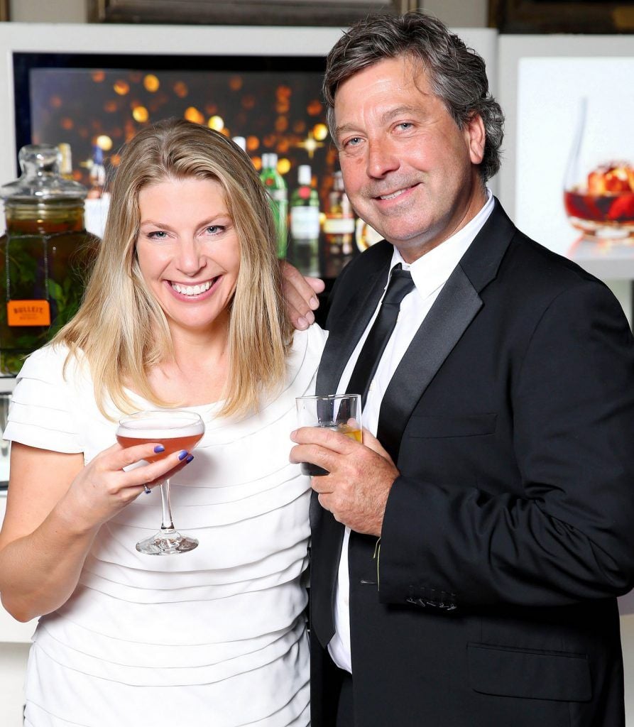 Pictured are Trisha Feely and  John Torode as Andrew Dickey representing The Merchant Hotel's Cocktail Bar in Belfast was crowned as the World Class Irish Bartender of the Year 2016 at the World Class Irish Final which took place in The Kings Inns.


Pic: Marc O'Sullivan
