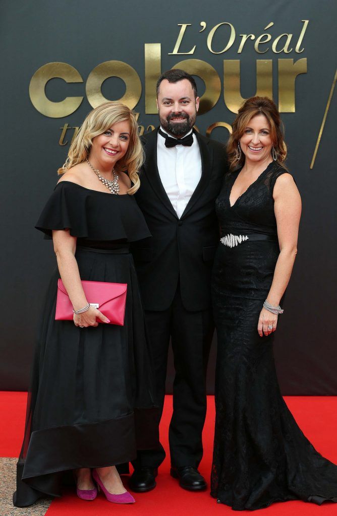 
Ciara Wilson with Aidan O’Mahony and Linda Lewis, pictured at the 50th anniversary L’Oreal Colour Trophy held in the Convention Centre, Dublin. Pic. Robbie Reynolds
