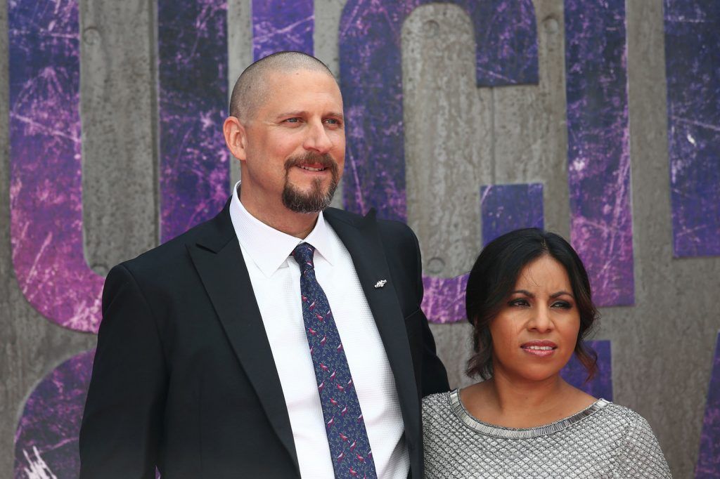 US director David Ayer (L) and his wife Maria pose as they arrive to attend the European premiere of the film Suicide Squad in central London on August 3, 2016.  / AFP / JUSTIN TALLIS        (Photo credit JUSTIN TALLIS/AFP/Getty Images)