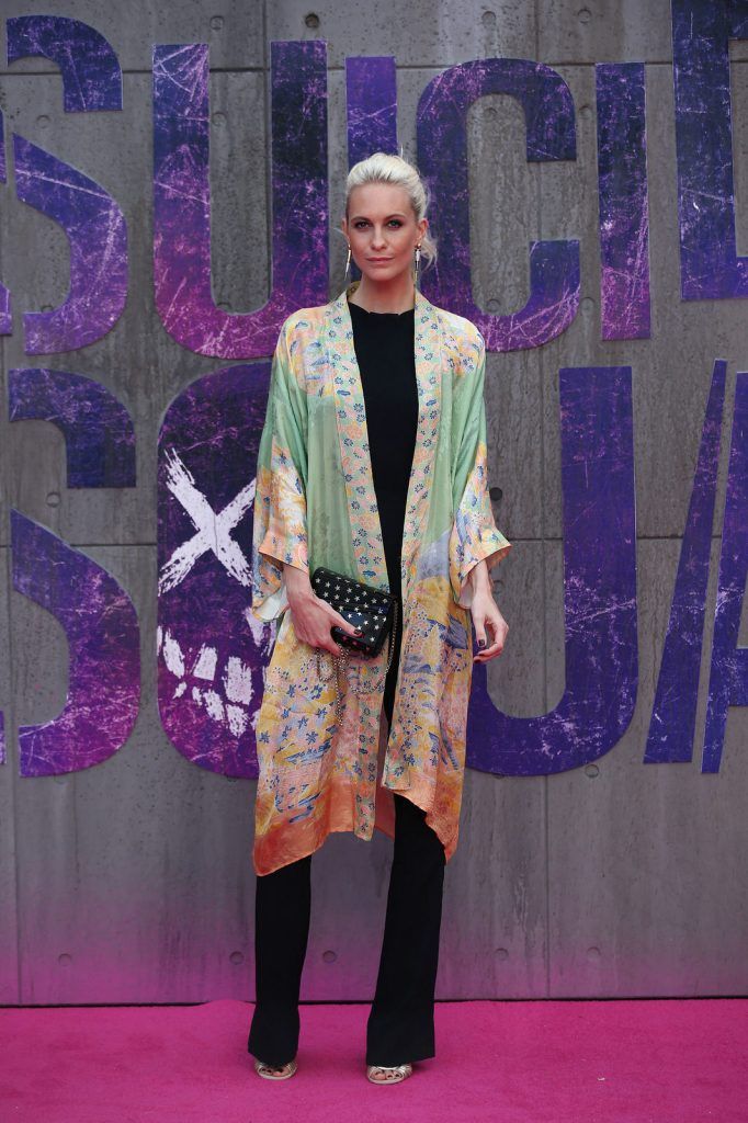 British model Poppy Delevingne poses as she arrives to attend the European premiere of the film Suicide Squad in central London on August 3, 2016.  / AFP / JUSTIN TALLIS        (Photo credit JUSTIN TALLIS/AFP/Getty Images)