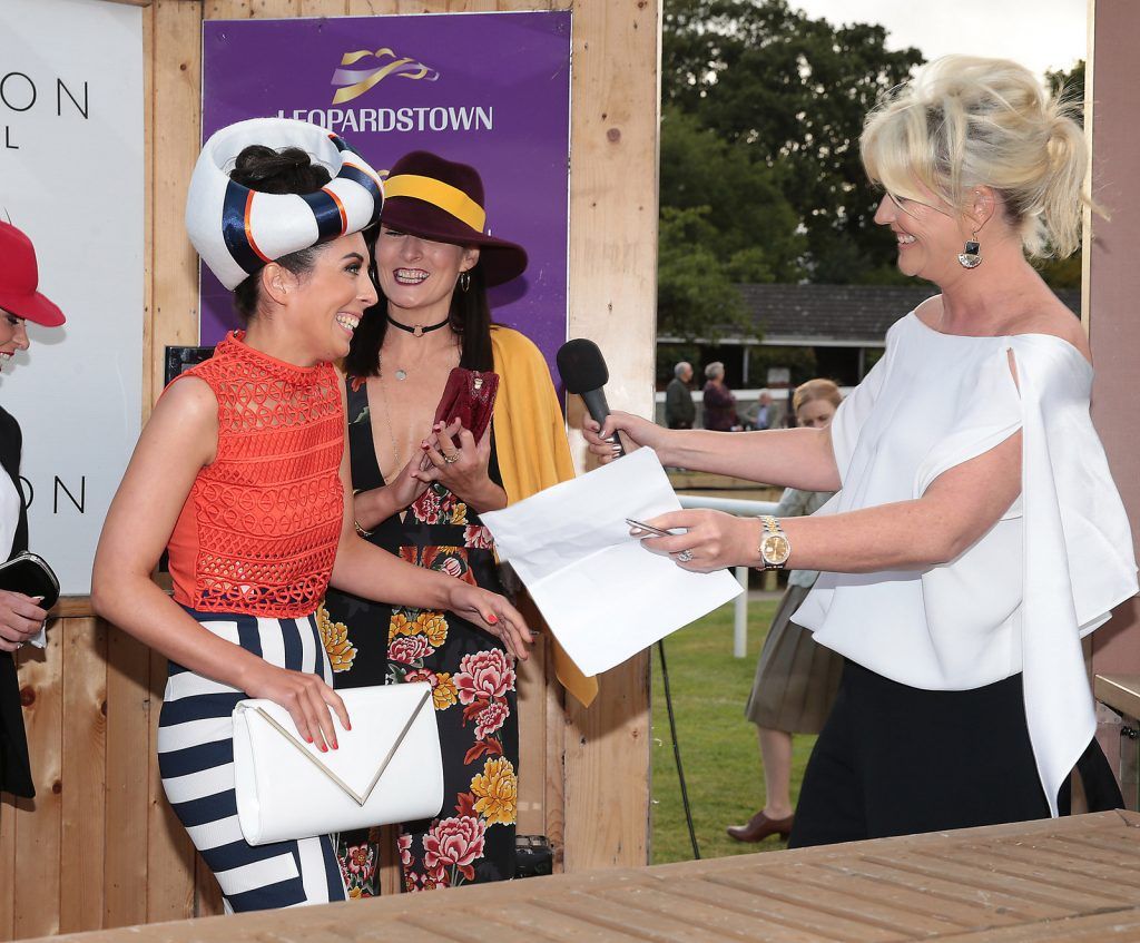 Lisa Fitzpatrick congratulates overall winner Bernadette Ni Chadhain from Galway (second from right) at the final of The Beacon Hotel's  Dare to be Different Best Dressed Competition at The Leopardstown Evening Race meeting. (Photo by Brian McEvoy)