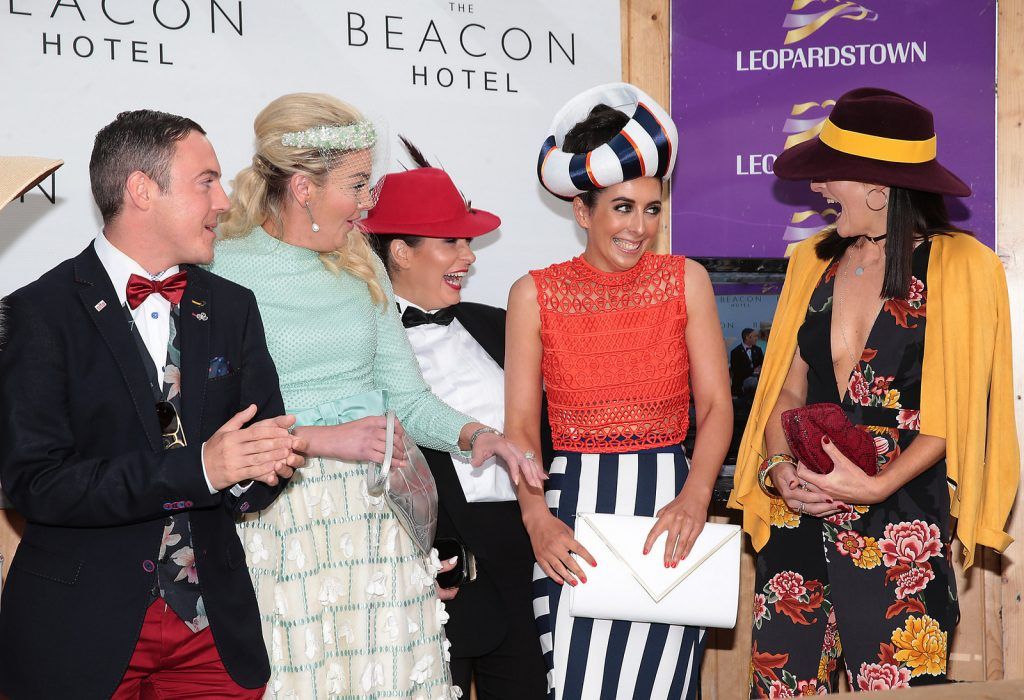 Finalists congratulate overall winner Bernadette Ni Chadhain from Galway (second from right)  at the final of The Beacon Hotel's  Dare to be Different Best Dressed Competition at The Leopardstown Evening Race meeting. (Photo by Brian McEvoy)