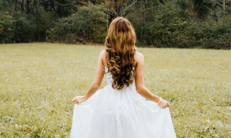 This bride breaking the 'you only wear your wedding dress once' rule is our hero