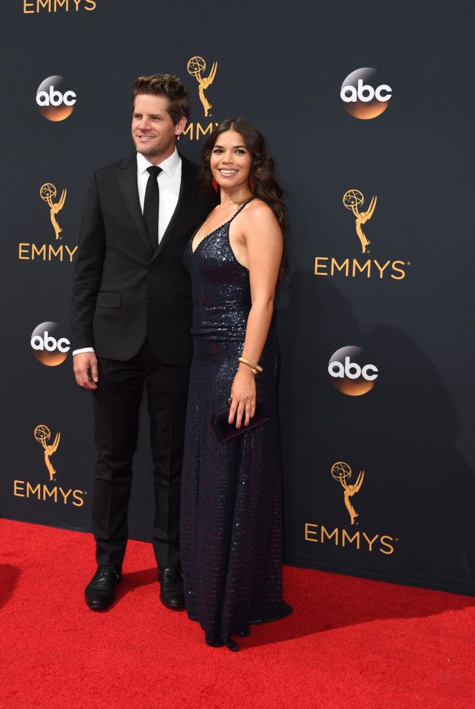 Actress America Ferrera (R) and Ryan Piers Williams arrive for the 68th Emmy Awards on September 18, 2016 at the Microsoft Theatre in Los Angeles.  / AFP / Robyn Beck  (Photo ROBYN BECK/AFP/Getty Images)