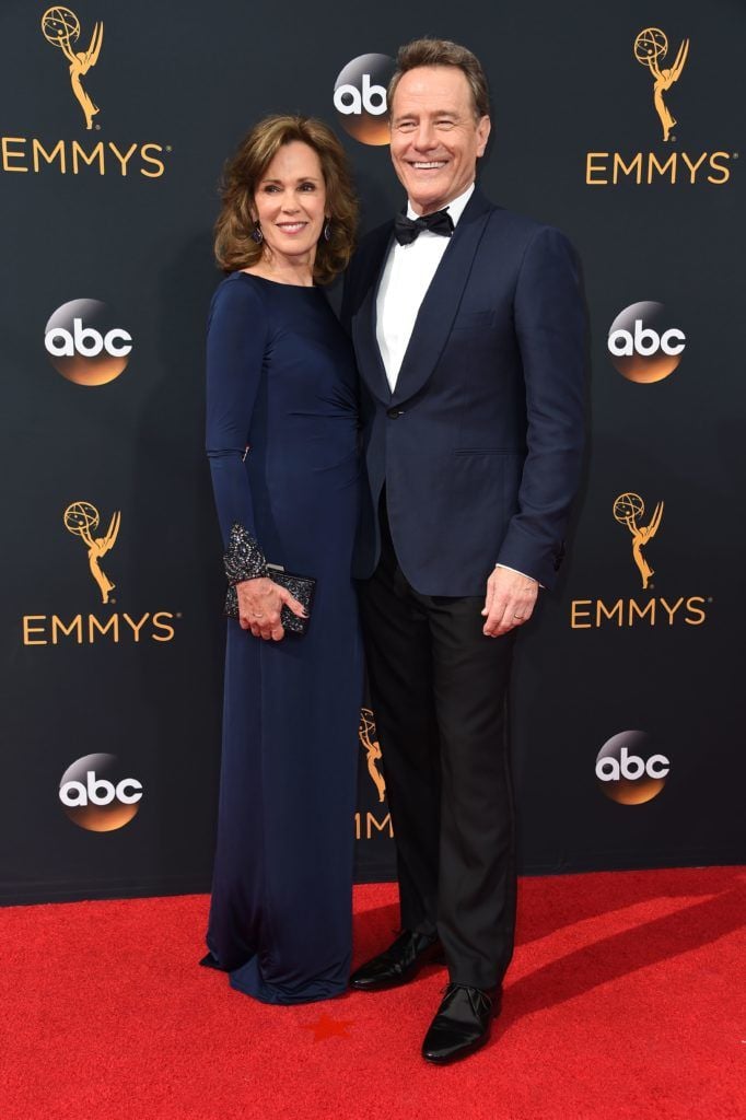 Actor Bryan Cranston and his wife, actress Robin Dearden, arrive for the 68th Emmy Awards on September 18, 2016 at the Microsoft Theatre in Los Angeles.  / AFP / Robyn Beck (Photo ROBYN BECK/AFP/Getty Images)
