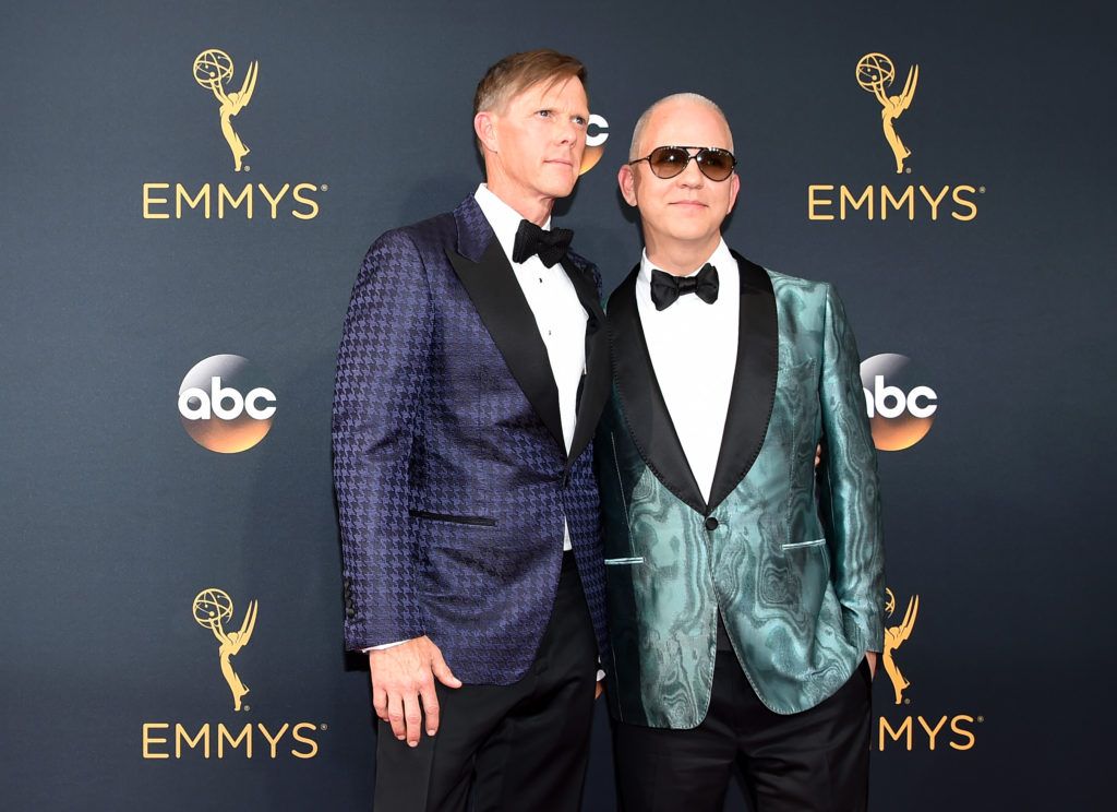 David Miller (L) and Ryan Murphy arrive for the 68th Emmy Awards on September 18, 2016 at the Microsoft Theatre in Los Angeles.  / AFP / Robyn Beck        (Photo ROBYN BECK/AFP/Getty Images)