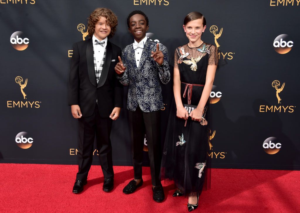(L-R) Actors Gaten Matarazzo, Caleb McLaughlin and Millie Bobby Brown attend the 68th Annual Primetime Emmy Awards at Microsoft Theater on September 18, 2016 in Los Angeles, California.  (Photo by Alberto E. Rodriguez/Getty Images)