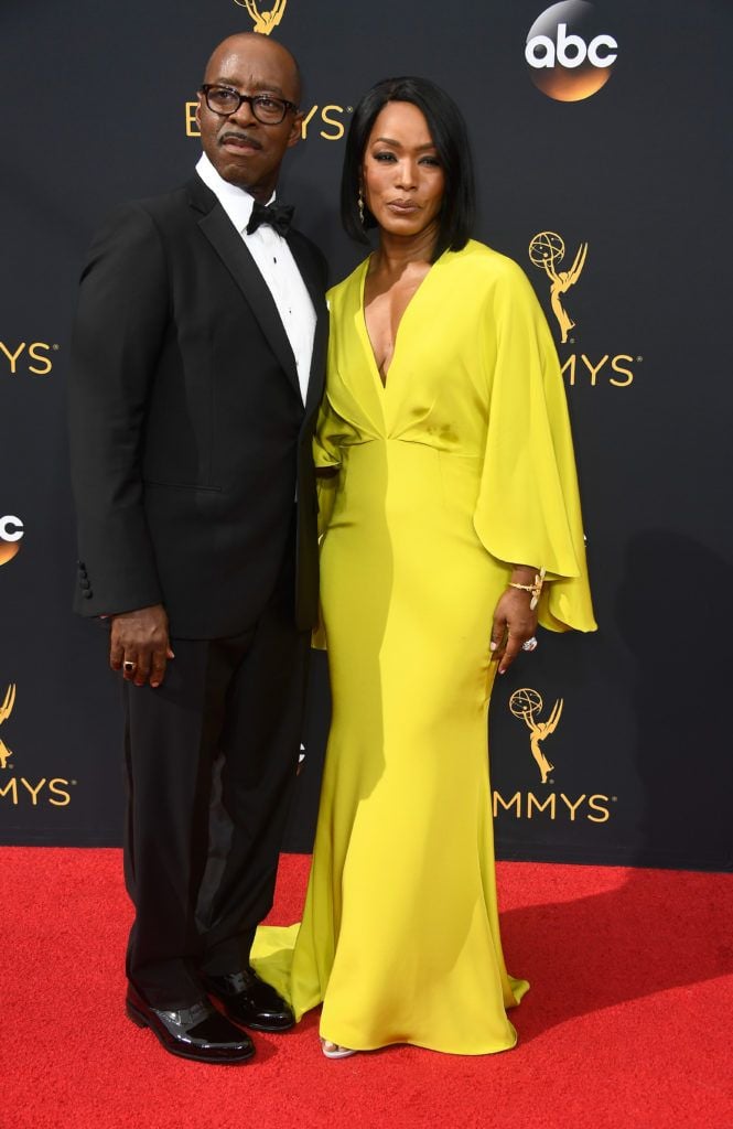Actors Courtney B. Vance (L) and Angela Bassett attend the 68th Annual Primetime Emmy Awards at Microsoft Theater on September 18, 2016 in Los Angeles, California.  (Photo by Frazer Harrison/Getty Images)