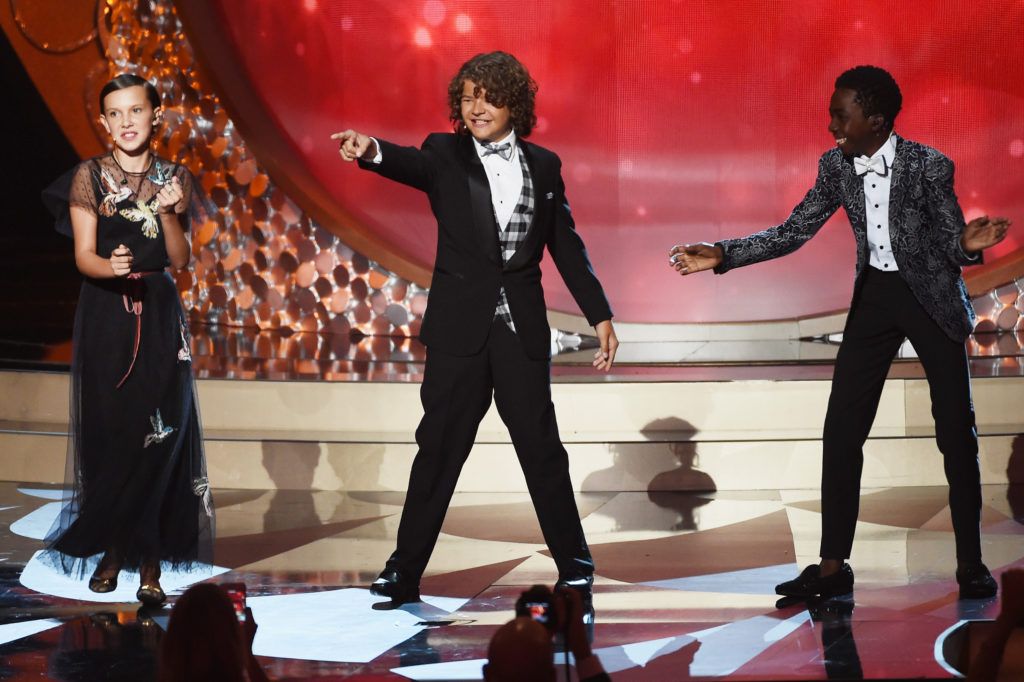(L-R) Actors Millie Bobby Brown, Gaten Matarazzo and Caleb McLaughlin perform onstage during the 68th Annual Primetime Emmy Awards at Microsoft Theater on September 18, 2016 in Los Angeles, California.  (Photo by Kevin Winter/Getty Images)