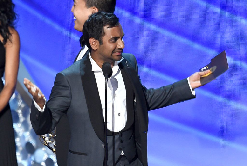 Actor/writer Aziz Ansari accepts Outstanding Writing for a Comedy Series for the 'Master of None' episode 'Parents' onstage during the 68th Annual Primetime Emmy Awards at Microsoft Theater on September 18, 2016 in Los Angeles, California.  (Photo by Kevin Winter/Getty Images)