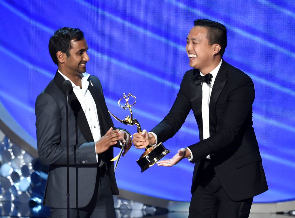 Actor/writer Aziz Ansari (L) and writer Alan Yang accept Outstanding Writing for a Comedy Series for the 'Master of None' episode 'Parents' onstage during the 68th Annual Primetime Emmy Awards at Microsoft Theater on September 18, 2016 in Los Angeles, California.  (Photo by Kevin Winter/Getty Images)