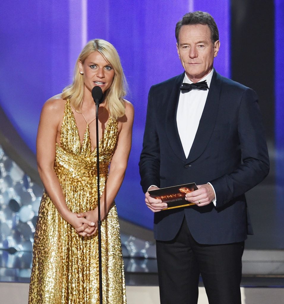 Actors Claire Danes (L) and Bryan Cranston speak onstage during the 68th Annual Primetime Emmy Awards at Microsoft Theater on September 18, 2016 in Los Angeles, California.  (Photo by Kevin Winter/Getty Images)