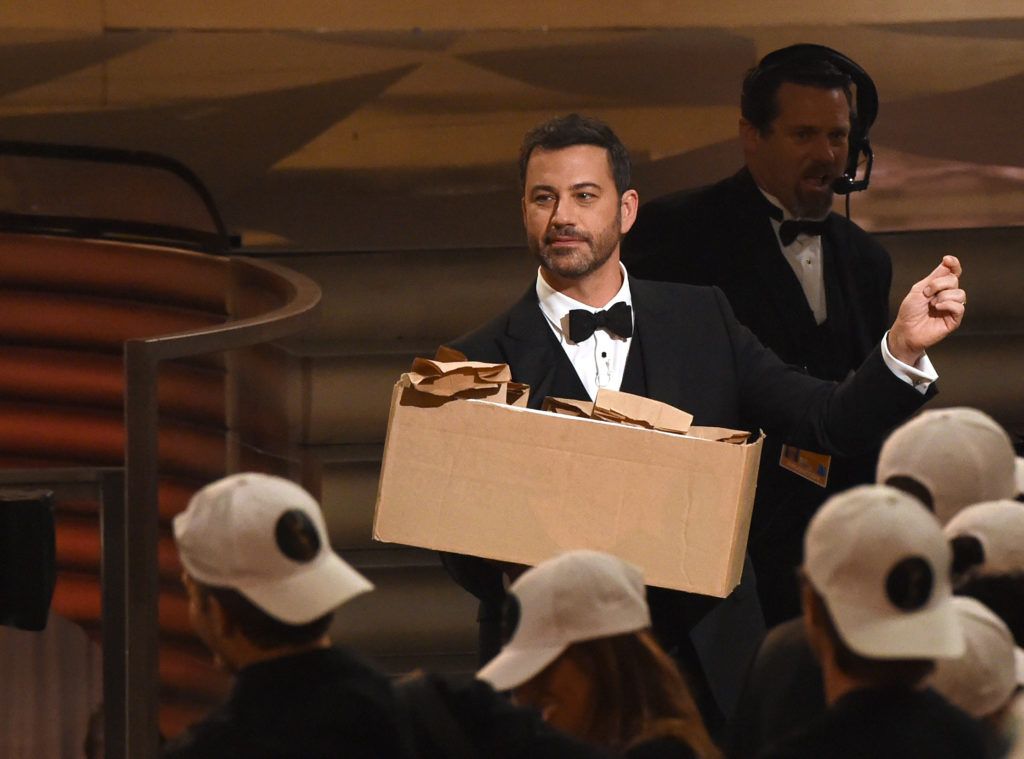 Host Jimmy Kimmel  hands out sandwiches during the 68th Emmy Awards show on September 18, 2016 at the Microsoft Theatre in downtown Los Angeles.  / AFP / Valerie MACON        (Photo VALERIE MACON/AFP/Getty Images)