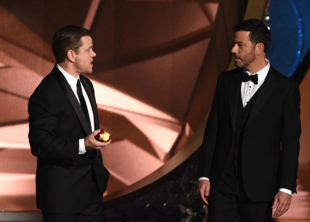 Actor Matt Damon (L) and host Jimmy Kimmel speak onstage during the 68th Emmy Awards show on September 18, 2016 at the Microsoft Theatre in downtown Los Angeles.  / AFP / Valerie MACON        (Photo VALERIE MACON/AFP/Getty Images)