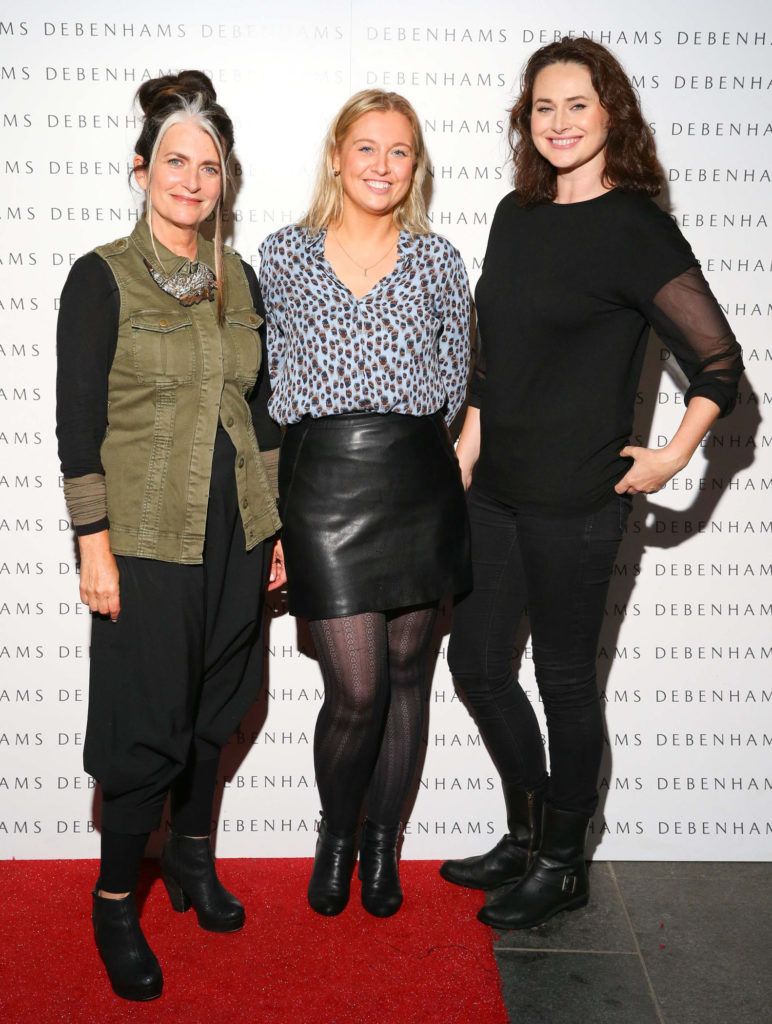 Pictured are Cathy O'Connor, Andrea Kissane and Corina Grant as Debenhams showcased their AW16 collection last night in the stunning back drop of Christ Church Catherdral. Guests sipped on Mc Guigan Frizzante as 1st Options Model took to the Crypt catwalk for a show styled by top stylist Sonja Mohlich. Pic: Marc O'Sullivan