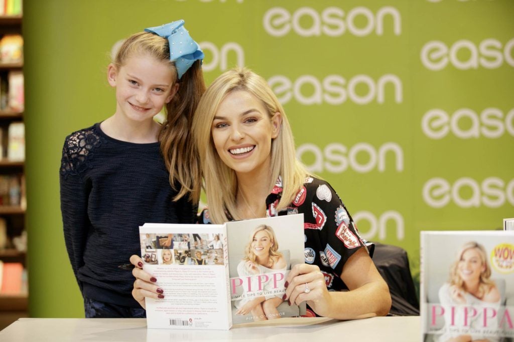 Pippa O’Connor pictured at Eason O’Connell Street where she was signing copies of her first book, Pippa: Simple Tips to Live Beautifully, a collection of practical tips and inspirational advice on all things fashion, beauty and lifestyle. Pippa is pictured with Sarah Moran (10) from Newbridge. Picture Andres Poveda