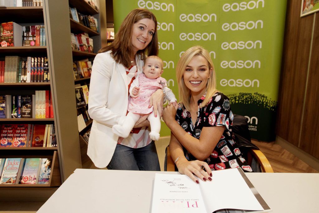 Pippa O’Connor pictured at Eason O’Connell Street where she was signing copies of her first book, Pippa: Simple Tips to Live Beautifully, a collection of practical tips and inspirational advice on all things fashion, beauty and lifestyle. Pippa is pictured with Jenny Quinlan and daughter Lucy (5 mths) form Stepaside Co Dublin. Picture Andres Poveda