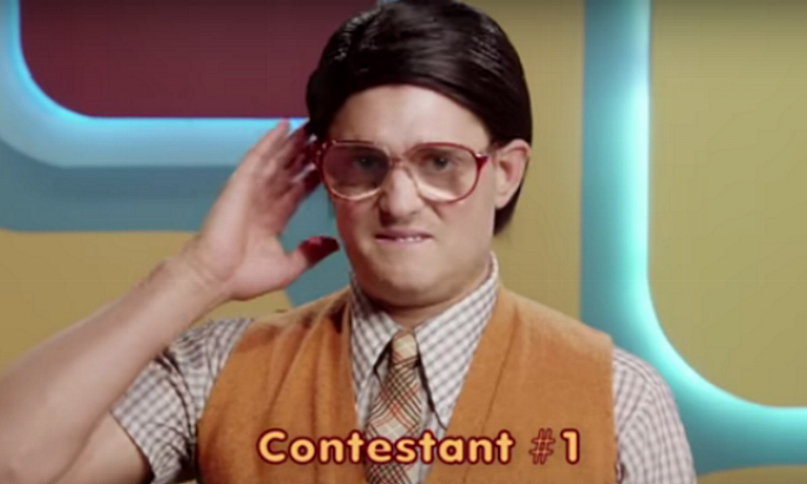 Can you recognise this very famous singer playing a nerdy character in his new video?