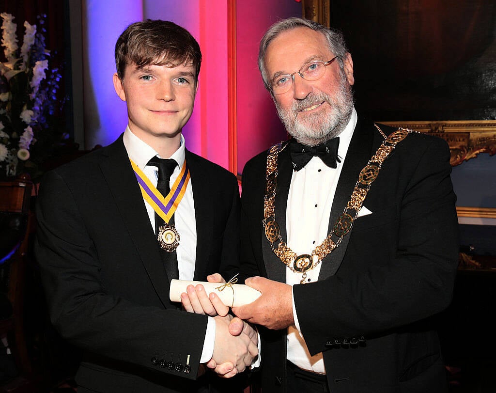 Douglas Grey congratulates Christopher Moriarty-Pearson after it was announced that he was the overall winner at The Irish Freemason's Young Musician of the Year Competition 2016 at Freemason Hall, Dublin (Picture: Brian McEvoy)