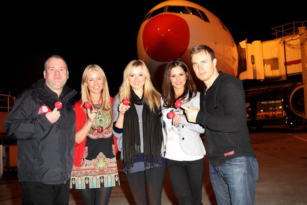 Chris Moyles, Denise Van Outen, Fearne Cotton, Cheryl and Gary Barlow pose before boarding a flight with Kenya Airlines to Tanzania to climb Mount Kilimanjaro in aid of Comic Relief at Heathrow Terminal 4 on February 27, 2009 in London, England. (Photo by Getty Images)
