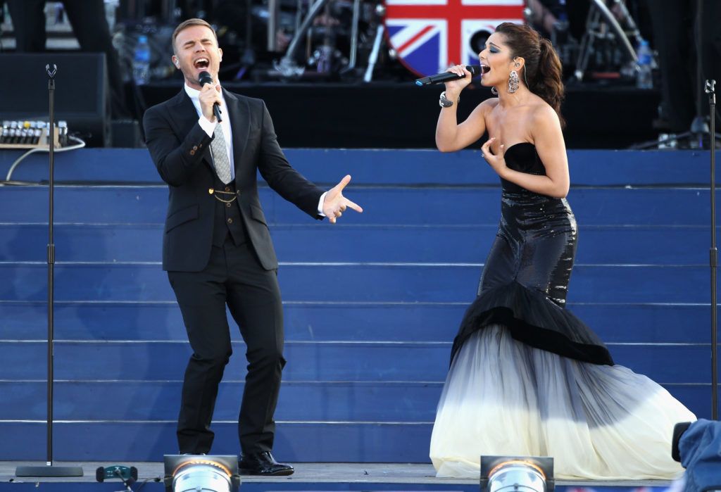 Gary Barlow and Cheryl perform on stage during the Diamond Jubilee concert at Buckingham Palace on June 4, 2012 (Photo by Dan Kitwood/Getty Images)