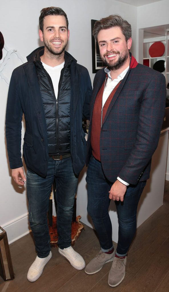 Jamie White and Jame Butler pictured at the unveil of The Anthony Peto Christmas Hat Collection in South Anne Street, Dublin (Picture: Brian McEvoy)