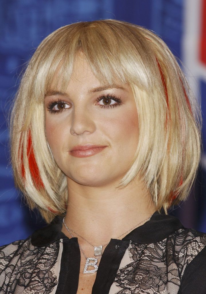WASHINGTON D.C. - SEPTEMBER 3: Singer Britney Spears attends a press conference for the 2003 "NFL Kickoff Live from the National Mall" at the Ritz-Carlton Hotel in Washington D.C. On September 4th thousands of American military personnel will attend the Washington D.C. concert featuring Spears, Mary J. Blige, Aerosmith, Good Charlotte, and Aretha Franklin. (Photo by Frank Micelotta/Getty Images)