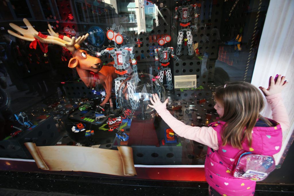 Pictured is Emma Miller (5) as Arnotts unveiled their iconic Christmas Windows, which reveal Santa's newest reindeer, Crackers, and also a pop up Tayto Crispmas Workshop. Photograph: Leon Farrell / Photocall Ireland