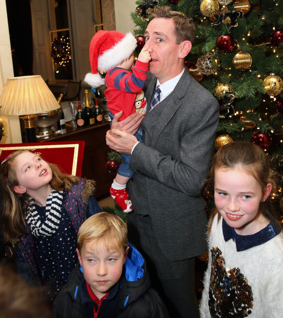 Pictured having a piece of Ryan's nose is Adam Neville aged 7 months with Ryan Tubridy at the annual Shelbourne Hotel Christmas Tree Lighting Ceremony. With the stunning tree officially lit up by very special guest Ryan Tubridy. Pic: Marc O'Sullivan