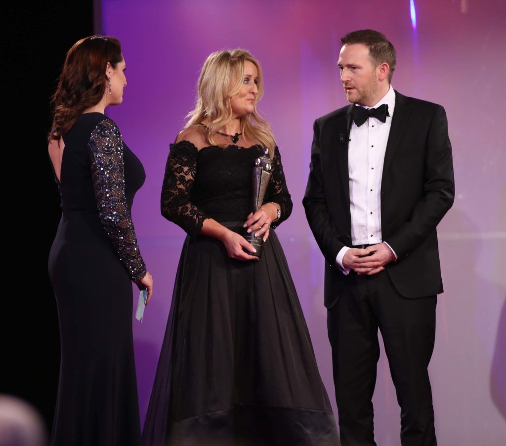 Mark and Roisin Molloy, pictured on stage with Grainne Seoige as they received their People of the Year Award presented by Claire Byrne. Pic. Robbie Reynolds