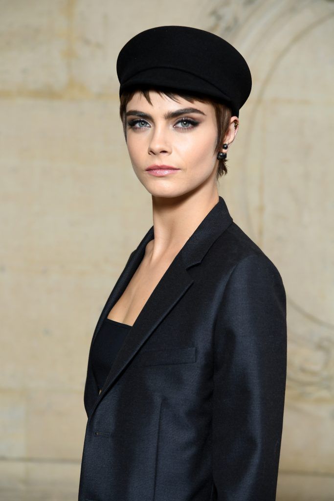 Cara Delevingne attends the Christian Dior show as part of the Paris Fashion Week Womenswear Fall/Winter 2018/2019 on February 27, 2018 in Paris, France.  (Photo by Pascal Le Segretain/Getty Images for Christian Dior)