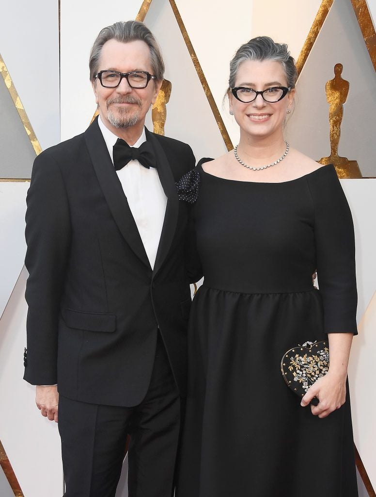 HOLLYWOOD, CA - MARCH 04:  Gary Oldman (L) and Gisele Schmidt attend the 90th Annual Academy Awards at Hollywood & Highland Center on March 4, 2018 in Hollywood, California.  (Photo by Frazer Harrison/Getty Images)