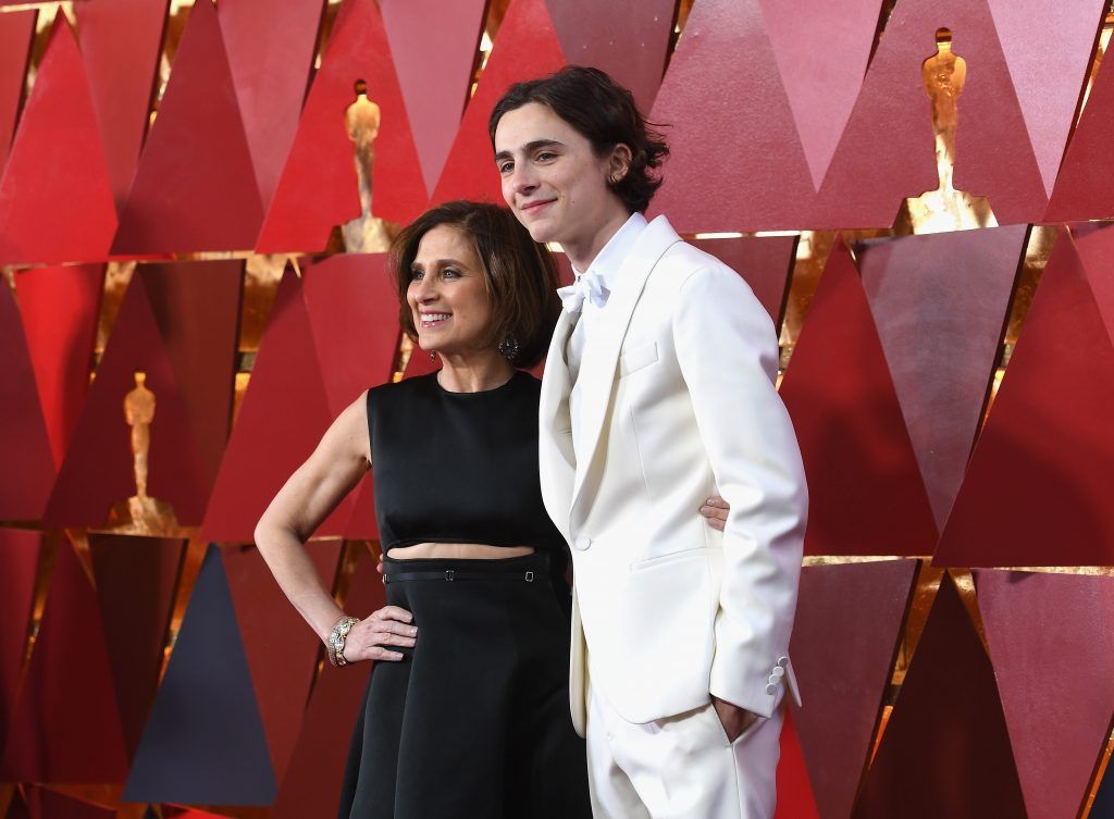 HOLLYWOOD, CA - MARCH 04:  Timothée Chalamet (R) and Nicole Flender attend the 90th Annual Academy Awards at Hollywood & Highland Center on March 4, 2018 in Hollywood, California.  (Photo by Kevork Djansezian/Getty Images)