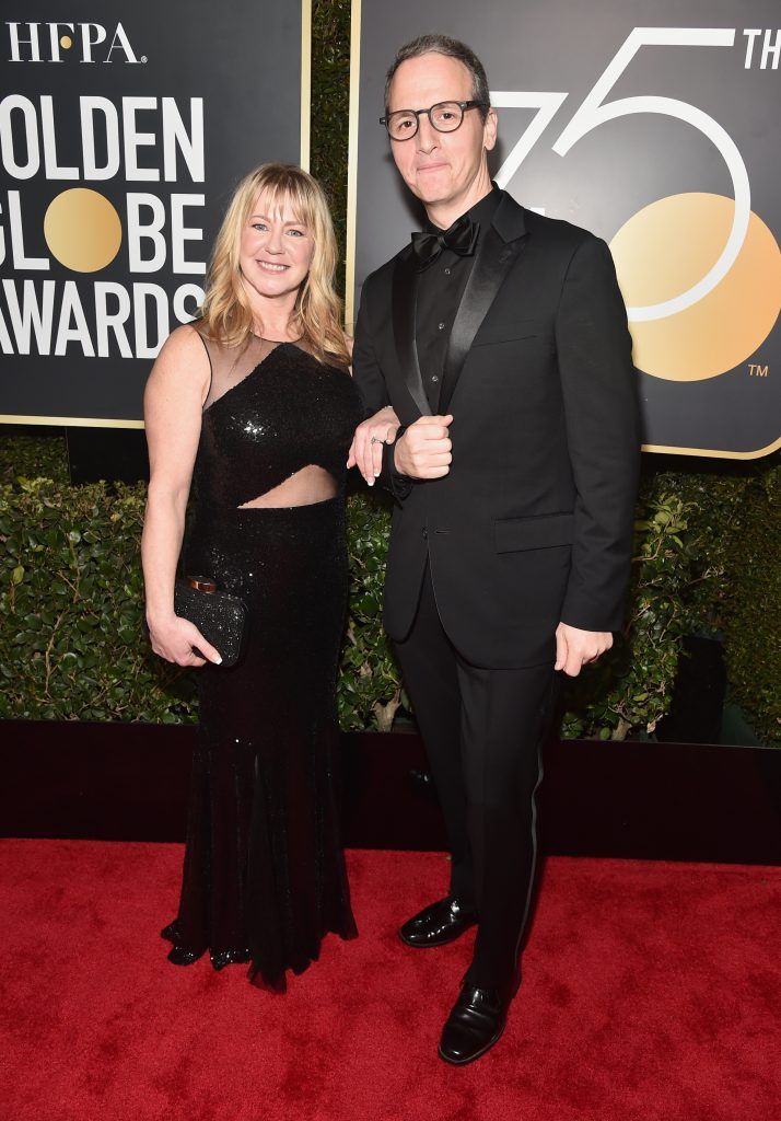 BEVERLY HILLS, CA - JANUARY 07:  Former figure skater Tonya Harding (L) and Tom Quinn attends The 75th Annual Golden Globe Awards at The Beverly Hilton Hotel on January 7, 2018 in Beverly Hills, California.  (Photo by Alberto E. Rodriguez/Getty Images)