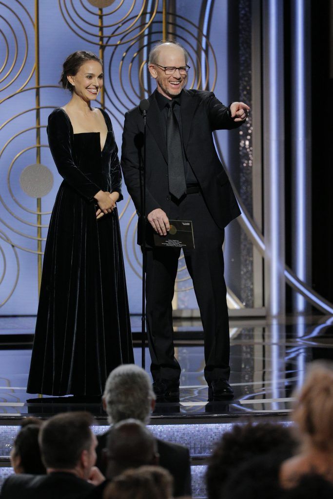 BEVERLY HILLS, CA - JANUARY 07:  In this handout photo provided by NBCUniversal,  Presenters Natalie Portman  and Ron Howard speak onstage during the 75th Annual Golden Globe Awards at The Beverly Hilton Hotel on January 7, 2018 in Beverly Hills, California.  (Photo by Paul Drinkwater/NBCUniversal via Getty Images)