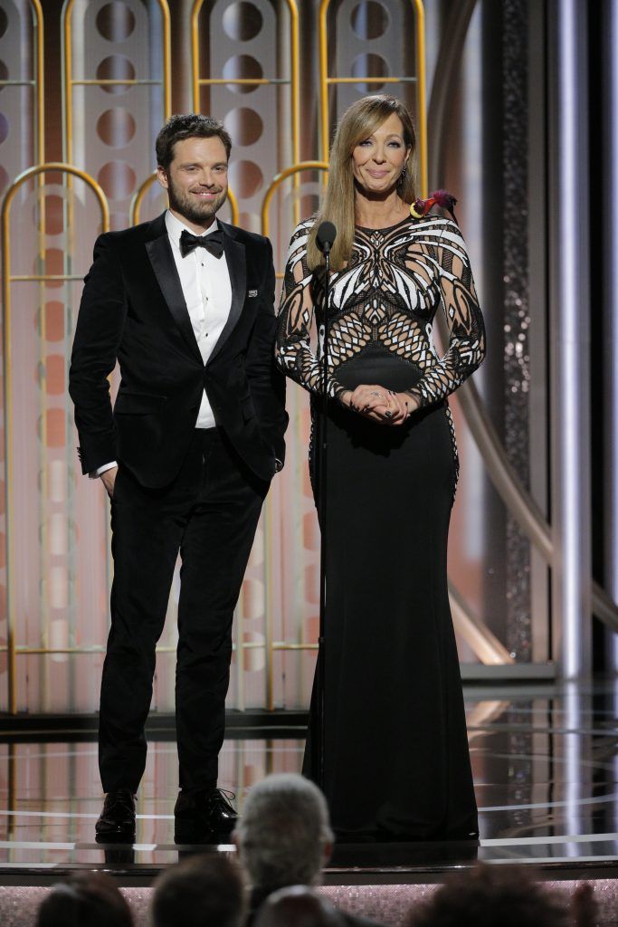BEVERLY HILLS, CA - JANUARY 07:  In this handout photo provided by NBCUniversal,  Presenters Sebastian Stan and  Allison Janney speak onstage during the 75th Annual Golden Globe Awards at The Beverly Hilton Hotel on January 7, 2018 in Beverly Hills, California.  (Photo by Paul Drinkwater/NBCUniversal via Getty Images)