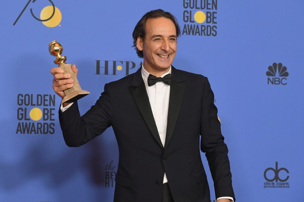 BEVERLY HILLS, CA - JANUARY 07:  Composer Alexandre Desplat poses with his award for Best Original Score Motion Picture for 'The Shape of Water' in the press room during The 75th Annual Golden Globe Awards at The Beverly Hilton Hotel on January 7, 2018 in Beverly Hills, California.  (Photo by Kevin Winter/Getty Images)