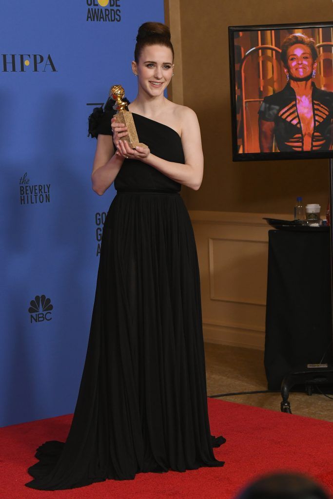 BEVERLY HILLS, CA - JANUARY 07:  Actor Rachel Brosnahan poses with her award for Best Performance by an Actress in a Television Series Musical or Comedy for 'The Marvelous Mrs. Maisel' in the press room during The 75th Annual Golden Globe Awards at The Beverly Hilton Hotel on January 7, 2018 in Beverly Hills, California.  (Photo by Kevin Winter/Getty Images)