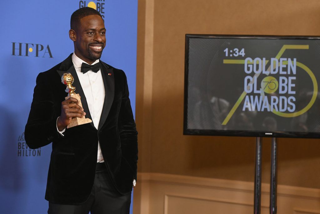 BEVERLY HILLS, CA - JANUARY 07:  Actor Sterling K. Brown holds his award for Best Performance by an Actor In A Television Series Drama in 'This Is Us' in the press room during The 75th Annual Golden Globe Awards at The Beverly Hilton Hotel on January 7, 2018 in Beverly Hills, California.  (Photo by Kevin Winter/Getty Images)