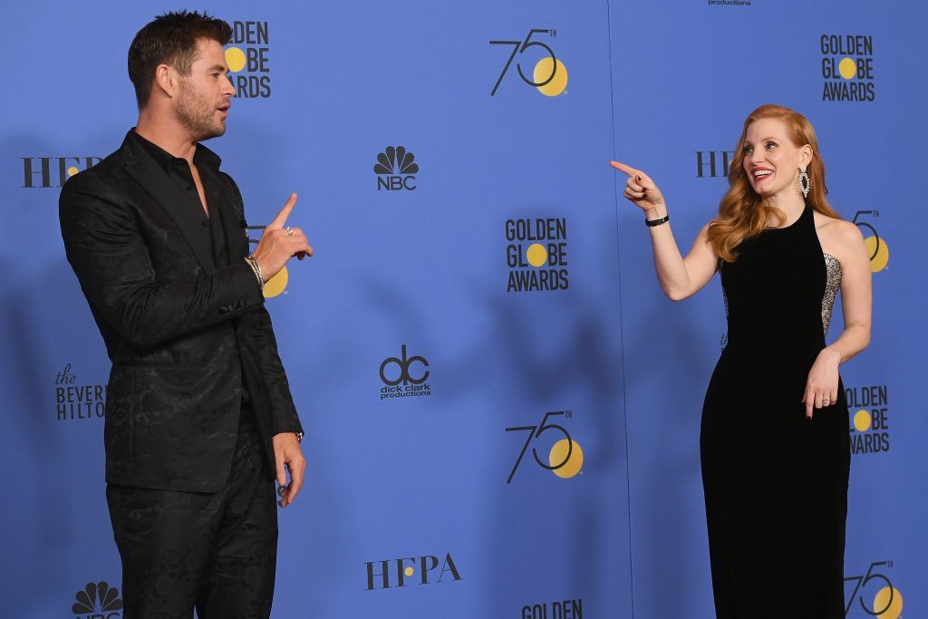 BEVERLY HILLS, CA - JANUARY 07:  Actors Chris Hemsworth and Jessica Chastain pose in the press room during The 75th Annual Golden Globe Awards at The Beverly Hilton Hotel on January 7, 2018 in Beverly Hills, California.  (Photo by Kevin Winter/Getty Images)