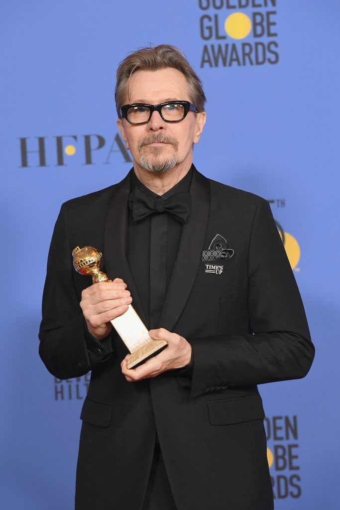 BEVERLY HILLS, CA - JANUARY 07:  Actor Gary Oldman poses with the award for Best Performance by an Actor in a Motion Picture Drama for 'Darkest Hour' in the press room during The 75th Annual Golden Globe Awards at The Beverly Hilton Hotel on January 7, 2018 in Beverly Hills, California.  (Photo by Kevin Winter/Getty Images)