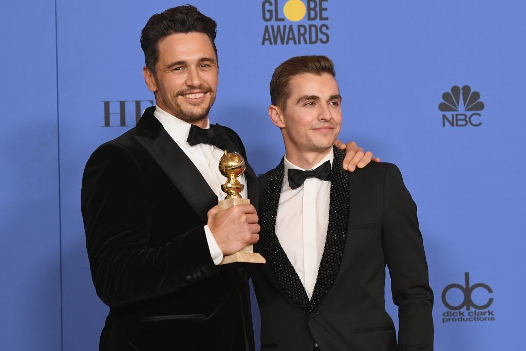 BEVERLY HILLS, CA - JANUARY 07:  Dave Franco (R) poses with James Francoand his award for Best Performance by an Actor in a Motion Picture Musical or Comedy in 'The Disaster Artist' in the press room during The 75th Annual Golden Globe Awards at The Beverly Hilton Hotel on January 7, 2018 in Beverly Hills, California.  (Photo by Kevin Winter/Getty Images)