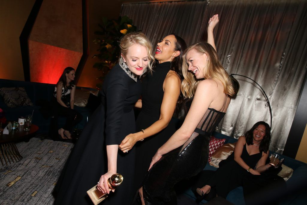 Actors Elisabeth Moss, Amanda Brugel and Yvonne Strahovski attend Hulu's 2018 Golden Globes After Party at The Beverly Hilton Hotel on January 7, 2018 in Beverly Hills, California.  (Photo by Rachel Murray/Getty Images for Hulu)